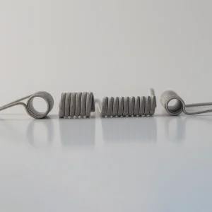 Hand‑wrapped Alien vape coil from Handsmade Premium Coils in Nichrome 80.